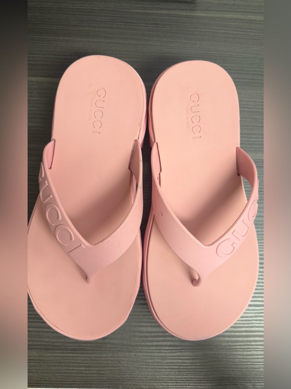 Gucci Pink Embossed Logo Rubber Flip Sandals